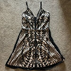 Black altard state dress with nude underliner